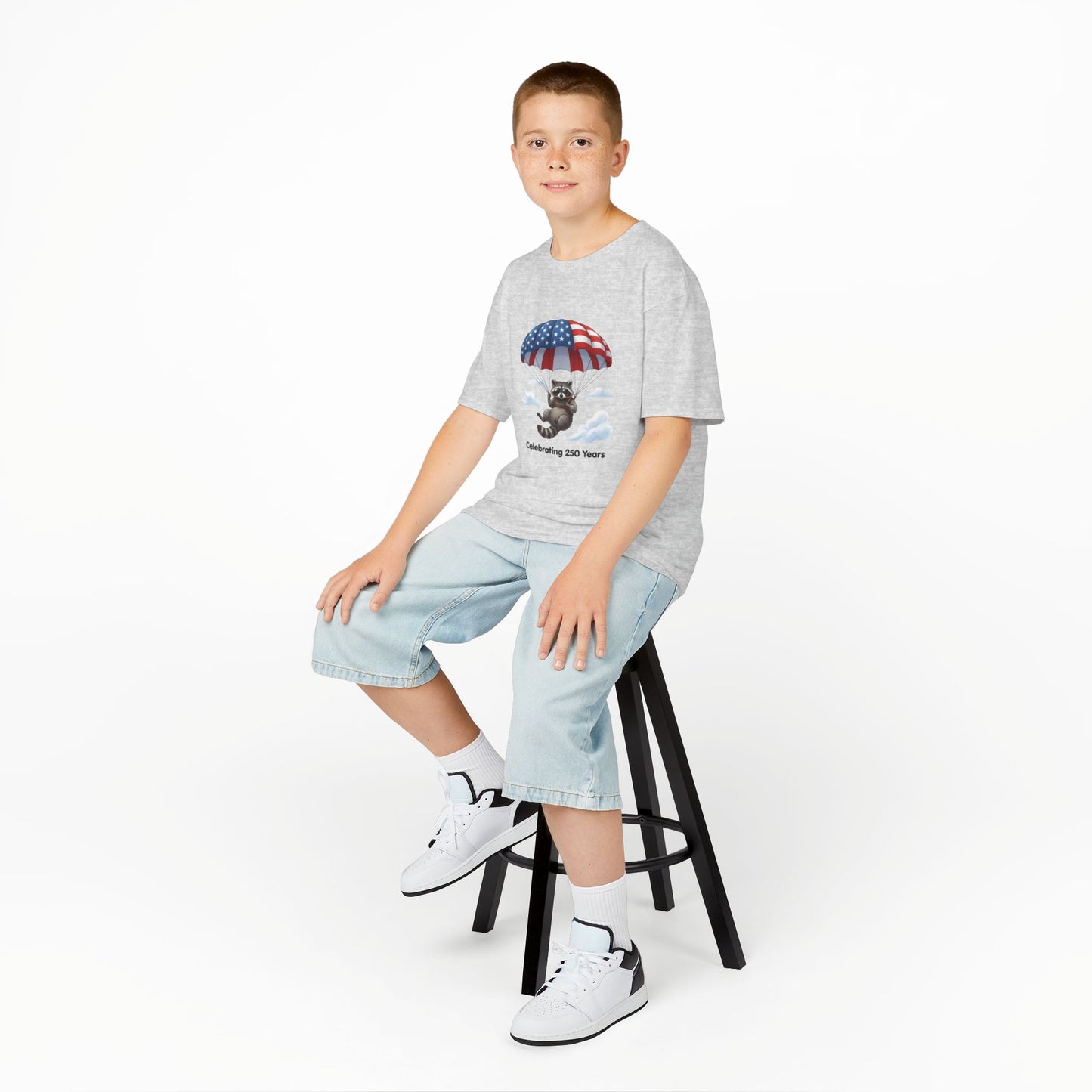 Kids T-Shirt — Patriotic Raccoon Parachute “Celebrating 250 Years”