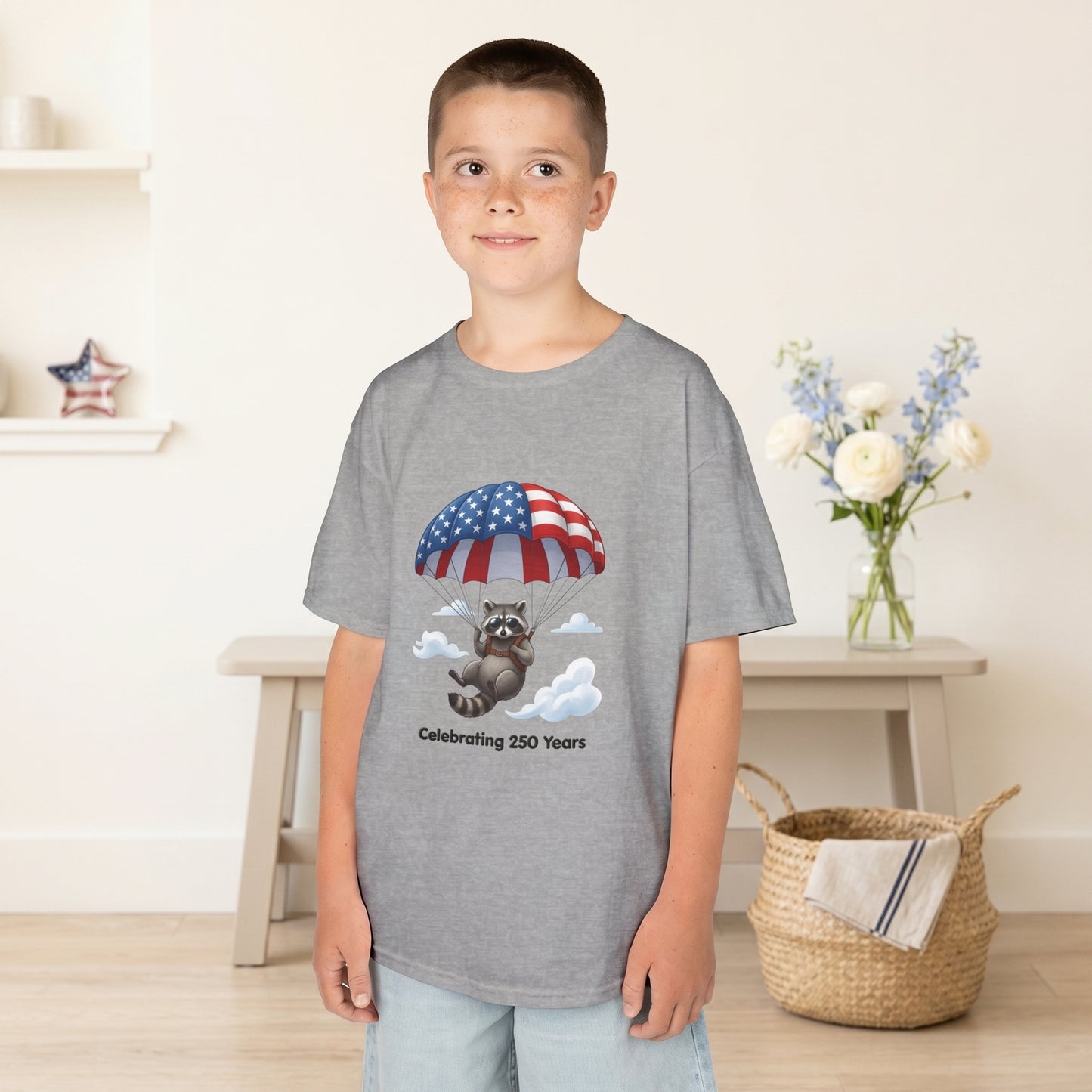 Kids T-Shirt — Patriotic Raccoon Parachute “Celebrating 250 Years”